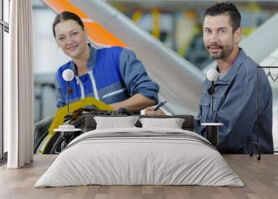 factory workers working with engine Wall mural