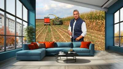 Farmer posing in his field Wall mural