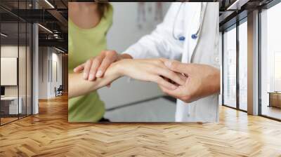 female hands showing carpal tunnel syndrome Wall mural