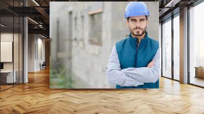 male engineer or architect with crossed arms Wall mural