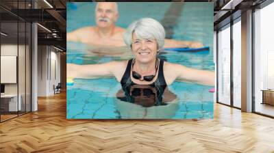 middle aged woman in swimming pool Wall mural