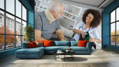 Nurse visiting patient at home Wall mural