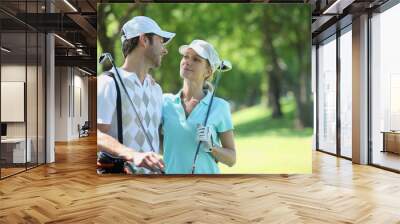 portrait of a couple in golf clothes Wall mural