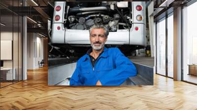 portrait of a happy garage specialist Wall mural