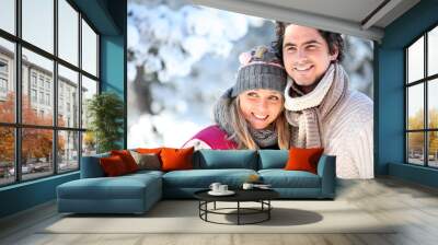 portrait of happy couple at winter resort Wall mural