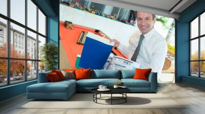 Salesman showing colour options for pool table Wall mural