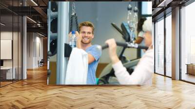 senior woman with trainer Wall mural