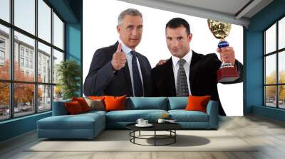 two businessmen holding trophy Wall mural