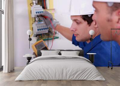 two technical engineers checking electrical equipment Wall mural