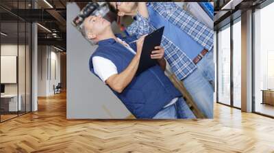 two workers workers in warehouse Wall mural