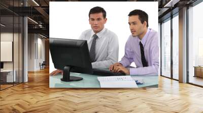 two young businessman working together Wall mural