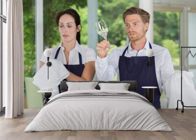 waiter and waitress polishing glass Wall mural