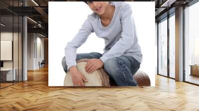 Young boy playing the djembe Wall mural