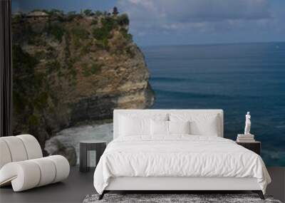 Cliff with the sea at bali, cloud and blue Wall mural