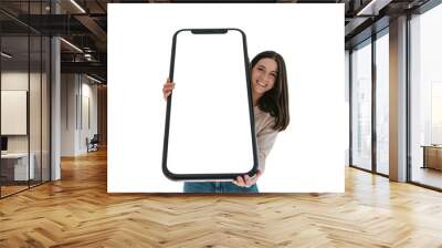 Smiling woman holding oversized smartphone with empty screen isolated on transparent background, smartphone mockup Wall mural