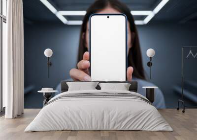 Woman showing smartphone with blank screen isolated on transparent background Wall mural