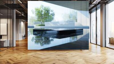 A black square sits on a marble countertop in front of a large window Wall mural