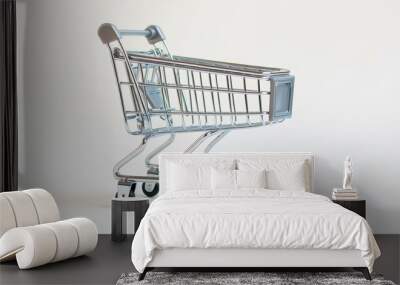 A shopping cart is shown on a white background Wall mural