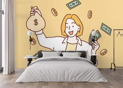 Successful american woman holding fan of money dollar bills.Hand drawn style vector design illustrations. Wall mural