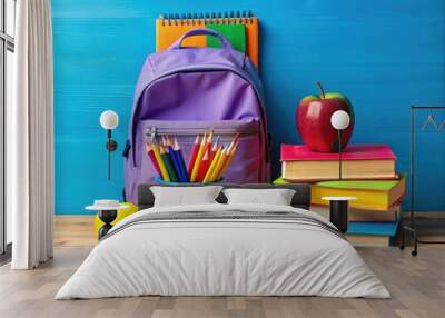 Brightly colored pencils and pens stand at attention, joining pages bursting with fresh knowledge, all nestled within a vibrant canvas, signaling the dawn of a new academic year. Wall mural