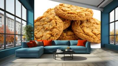 Softly lit, golden brown oatmeal cookies with crispy edges and sweet chunks, isolated on a clean white background, showcasing warm textures and appetizing details. Wall mural