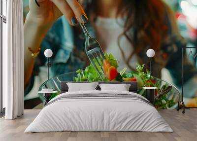 Closeup of woman eating healthy food salad Wall mural