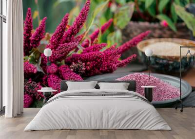 Flowering branches of amaranth next to its grain Wall mural