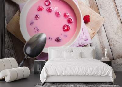 Fresh fruit soup with spoon, top view Wall mural