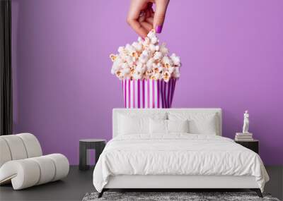 hands holding pink popcorn bliss- hands holding pink popcorn Wall mural