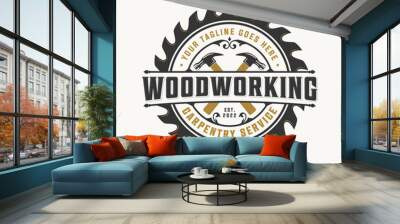 Vector graphic of woodworking vintage retro logo. Carpenter logo design with hammer and circular saw or blade. Carpentry logo sawmill emblem badge Wall mural