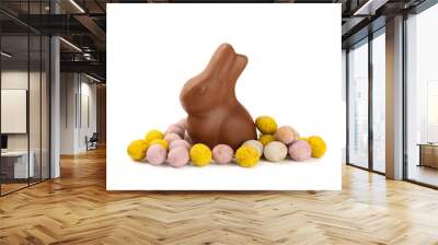 Easter chocolate bunny, chick and chocolate eggs isolated on white background. Chocolate eggs and other sweets. Easter celebration concept. Easter sweets on the table. Place for text. copy space. Wall mural