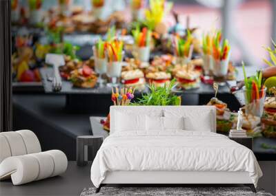 Beautifully decorated catering banquet white table with different food snacks and appetizers Wall mural