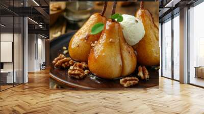 A closeup of delicious baked pears with nuts, ice cream and honey on a wooden table Wall mural