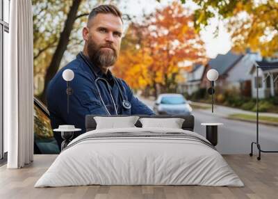 A medical doctor seated in a vehicle, perhaps on his way to work. Wall mural