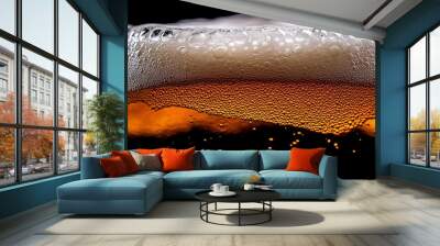 An elegant motion of beer splashing from a glass against a black background, with foam and droplets suspended in midair Wall mural