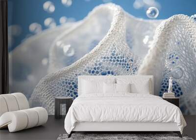 An illustration of a close-up of white fabric against a blue backdrop with drops of water. A concept of washing and keeping things clean. Wall mural