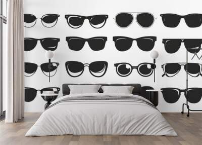 Black cartoon silhouette of sunglasses isolated on white background. Wall mural