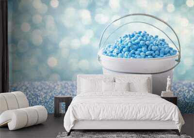 In a white cup with blue circles, blue round tablets create a colourful and inviting display Wall mural