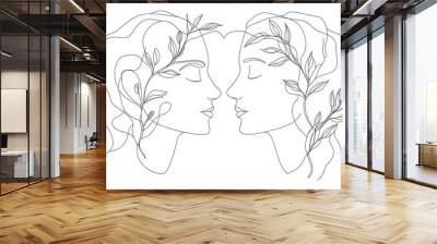 Line drawing of a woman's face with leaves. Wall mural