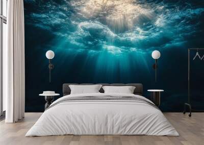 Stunning photo of marine life in deep blue water with rays of sunlight piercing it Wall mural