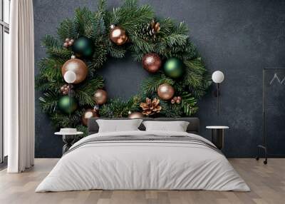 Stylish holiday decorations with ornaments and greenery on textured surfaces Wall mural