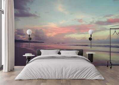 The shoreline of a luxury honeymoon resort. An idyllic sunrise beach that's set in the solitude of a tropical island. Wall mural