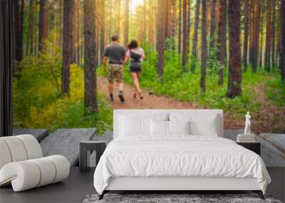 Empty table on the background of walking couple Wall mural