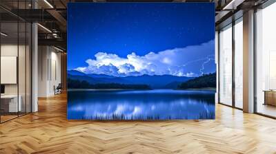 At night in summer, a Milky Way stretches across the beautiful mountains with lightning. Wall mural