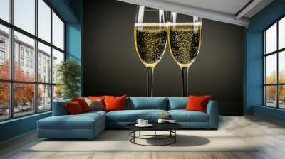 Images of two champagne glasses with spouts and drops on colored backgrounds. Wall mural