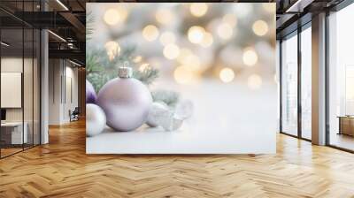 Stock photo of a purple christmas ornament sitting on top of a table. Wall mural