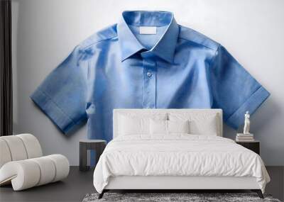 light blue dress shirt with textured fabric on white background, neatly folded sleeves, professional and elegant design perfect for business and fashion content Wall mural