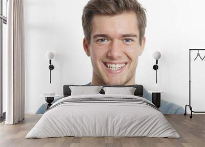 happy young man with big toothy smile isolated on white Wall mural