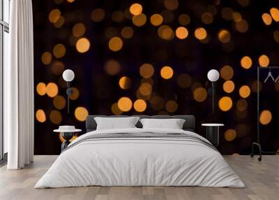 Bokeh golden blurred background. Abstract creative yellow bokeh background Wall mural