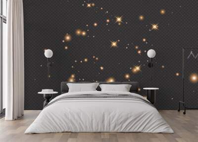 Set of gold glowing light effects isolated on dark background. Glow light effect. Star exploded sparkles. Wall mural